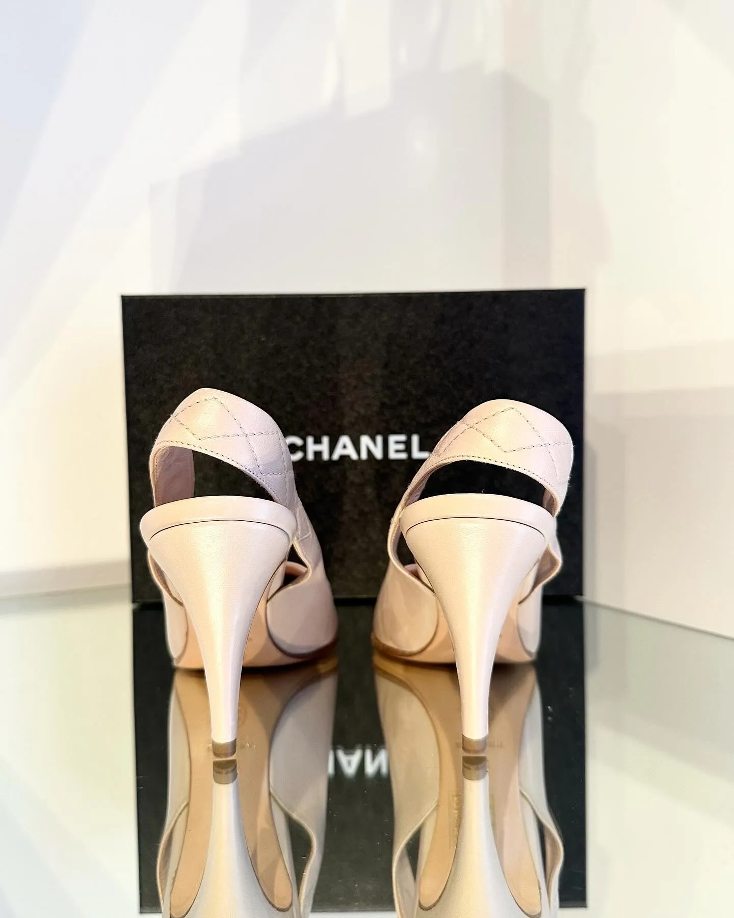 CHANEL Pointed Toe Mid Heel Leather Slides