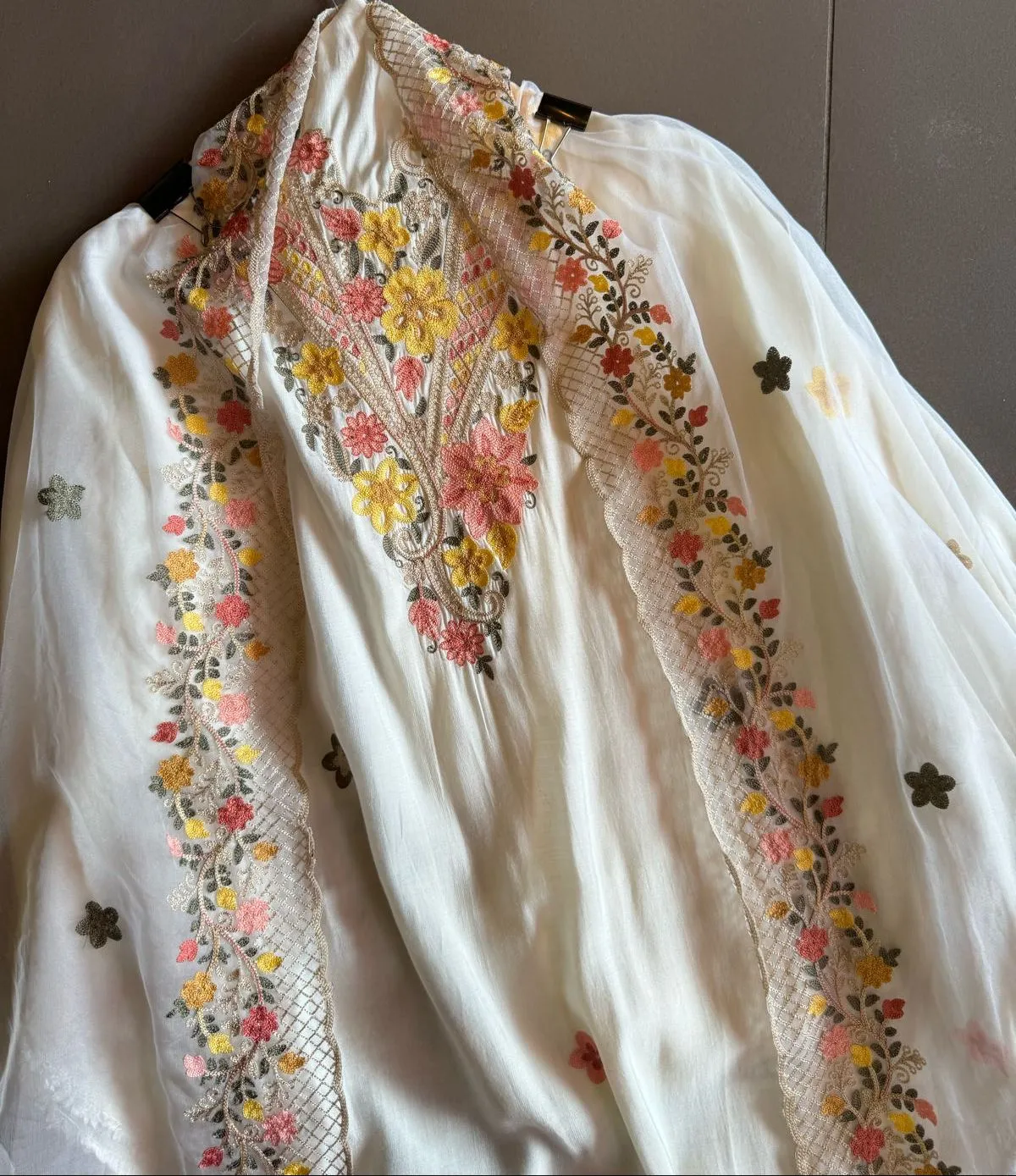 Soft cotton muslin shirt with thread embroidery done on the neckline